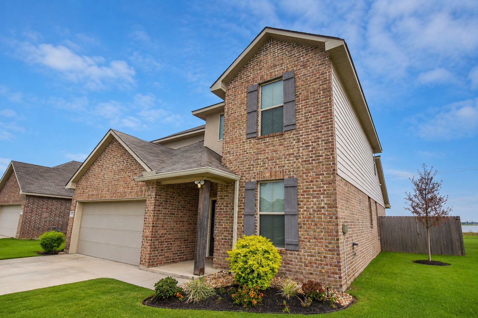 Brick two-story home exterior