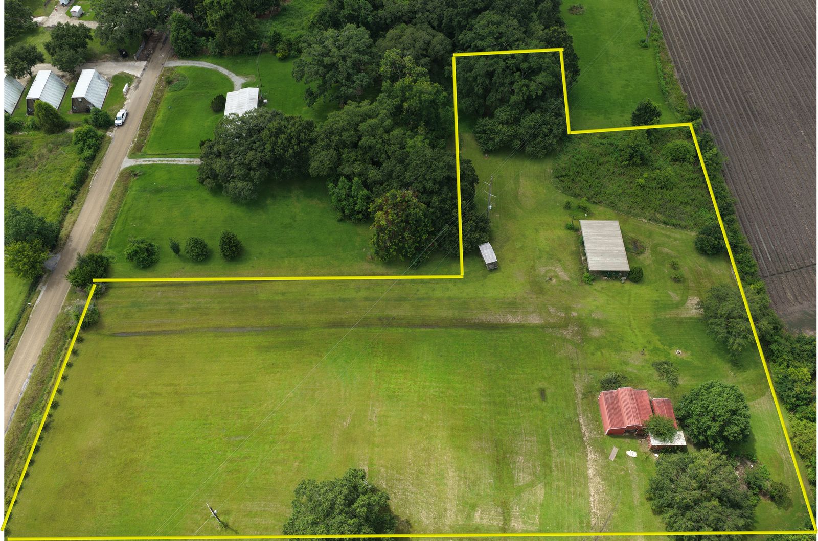 Aerial property image with an illustrative boundary line